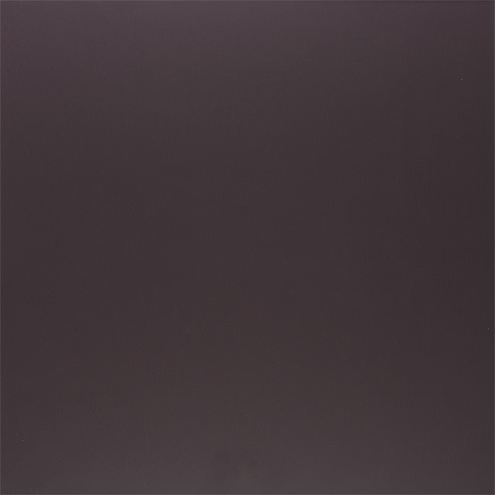 Eine schlichte dunkle Oberfläche mit einer glatten Textur, überwiegend schwarz mit subtilen Variationen in den Farbtönen, die ein Gefühl von Tiefe erzeugen.
